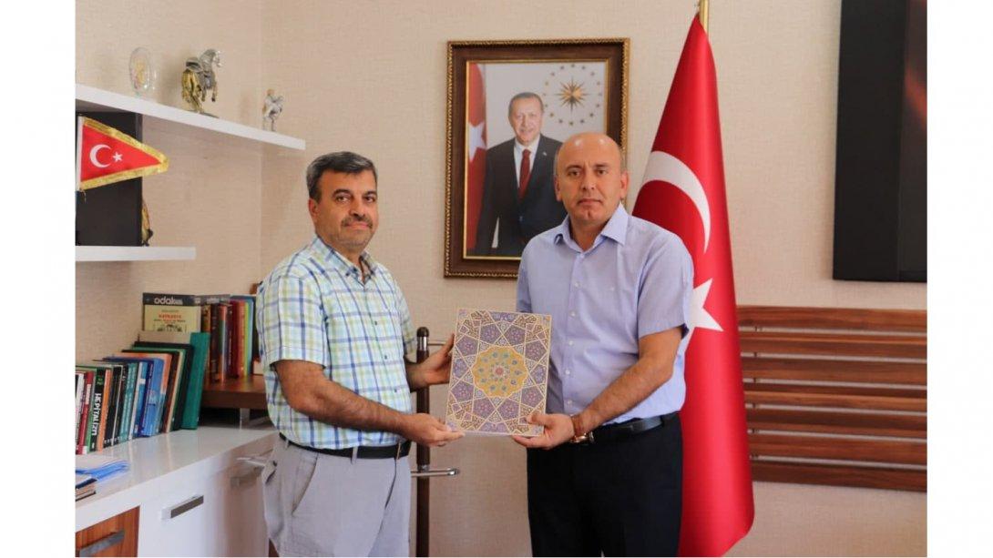 Türk ve İslam Eserleri Müzesi Müdürü Ekrem AYTAR, İlçe Milli Eğitim Müdürümüz Yakup ÖZBEK'i Ziyaret Etti.